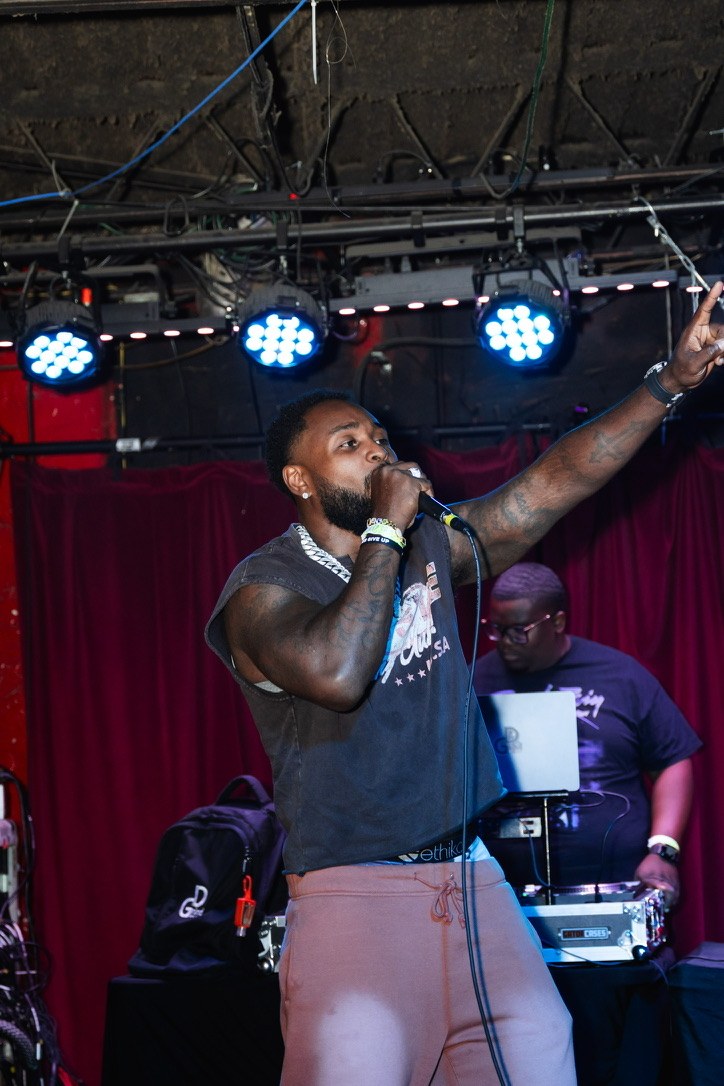 Tank performing live on stage